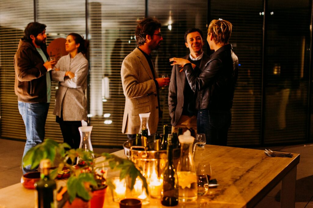 Guests in conversation at an evening reception